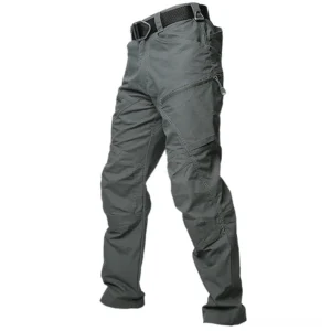 Gray-green military tactical cargo pants front view with three-dimensional cut, multiple tool pockets, and tactical belt - industrial goth style