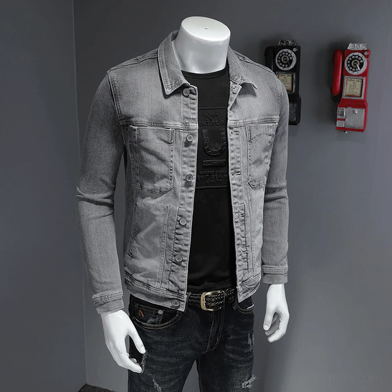 Grey denim jacket with buttoned cuffs and black printed inner shirt - detail view