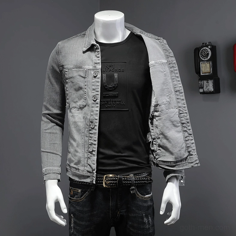 Open grey denim jacket revealing inner pockets and layering with dark jeans - pocket detail