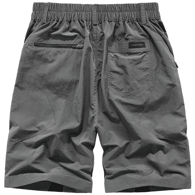 Grey tactical cargo shorts rear view showing elastic waistband and zippered back pockets for secure storage