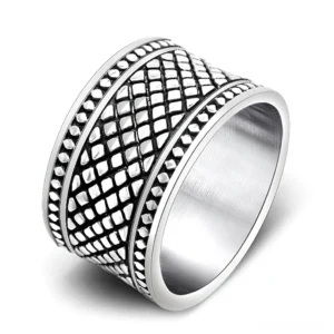 Geometric grid gothic ring silver stainless steel wide band three-quarter view studio shot
