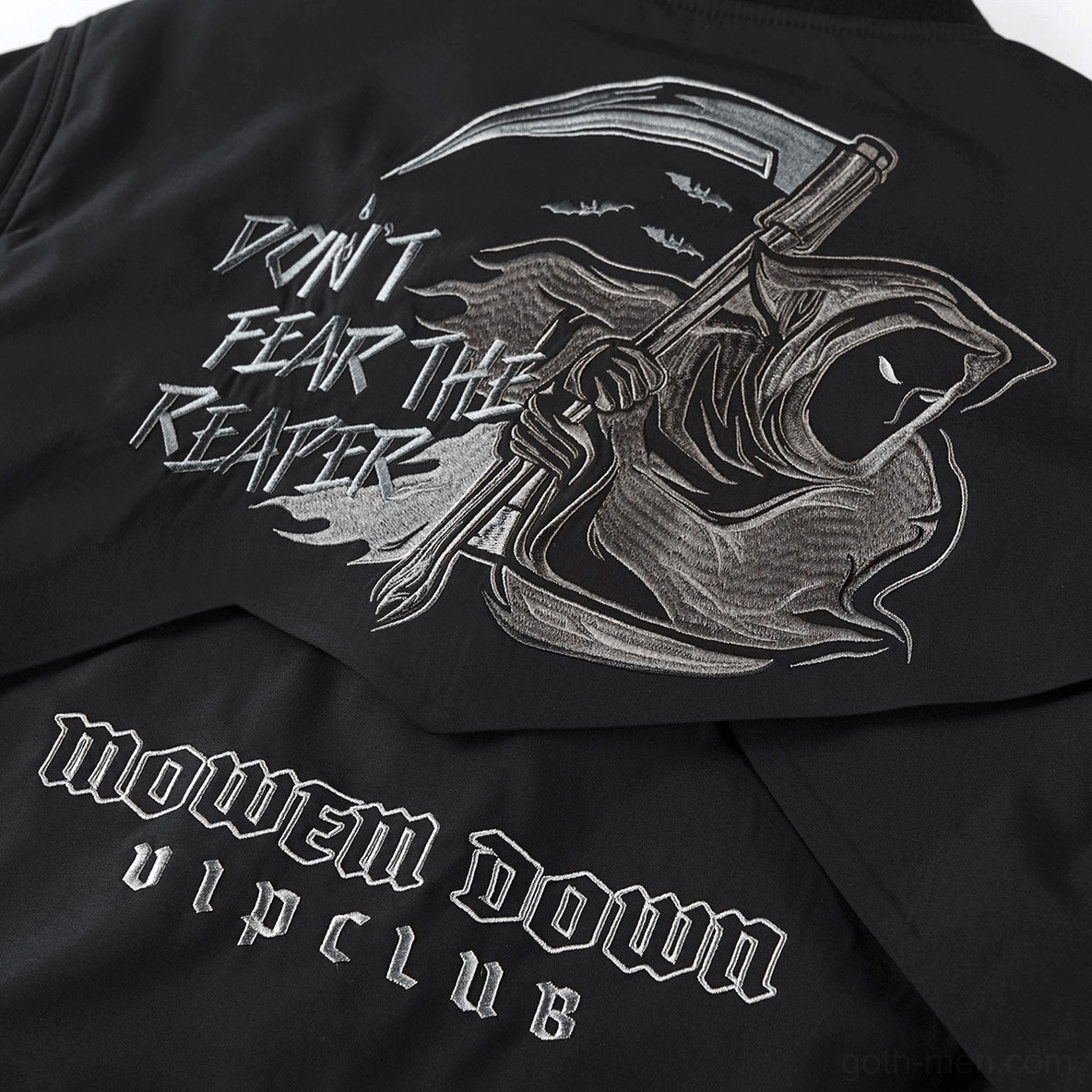 Large grim reaper back embroidery detail on goth tactical bomber jacket - multiple text prints and intricate stitching