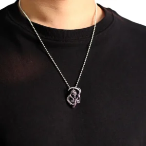 Gothic Grim Reaper pendant necklace worn on male model chest, antique silver finish on ball chain, dark crew neck styling