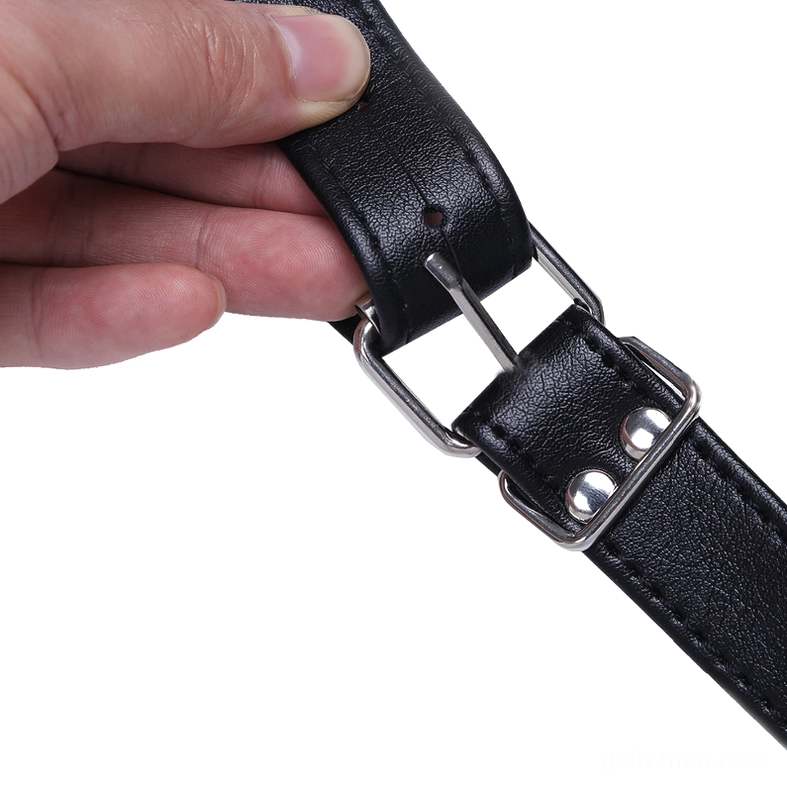 Gothic chest harness metal pin buckle fastener with fixed silver rivets on faux leather strap detail