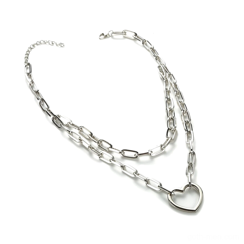 Double layer heart charm necklace flat lay, gothic heart pendant with silver link chain design top view