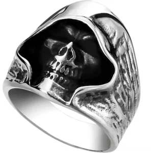 Hooded grim reaper skull ring front three-quarter view 316L stainless steel gothic jewelry with textured wing-patterned band