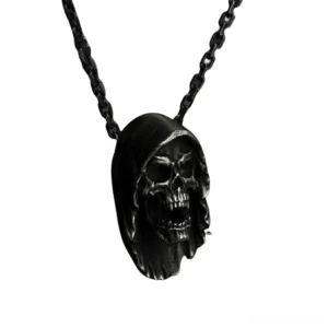 Hooded grim reaper skull stainless steel pendant necklace - left three-quarter view showing intricate carved details and blackened metal finish