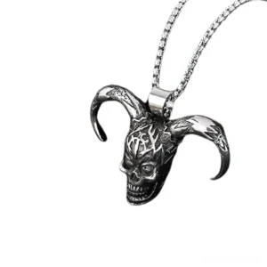 Antique dark silver horned skull necklace pendant three quarter side view tribal carvings