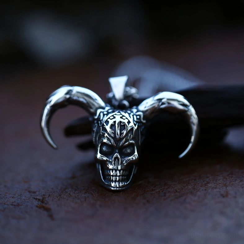 Vintage dark silver horned skull pendant tribal occult design gothic necklace rustic background