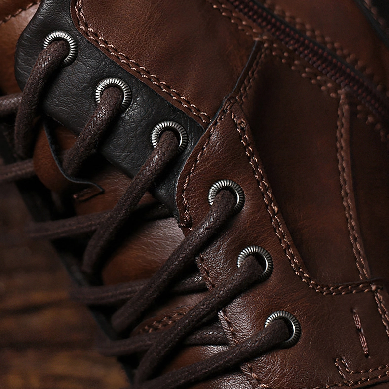 Gothic split leather ankle boots featuring industrial-style construction and reinforced seams