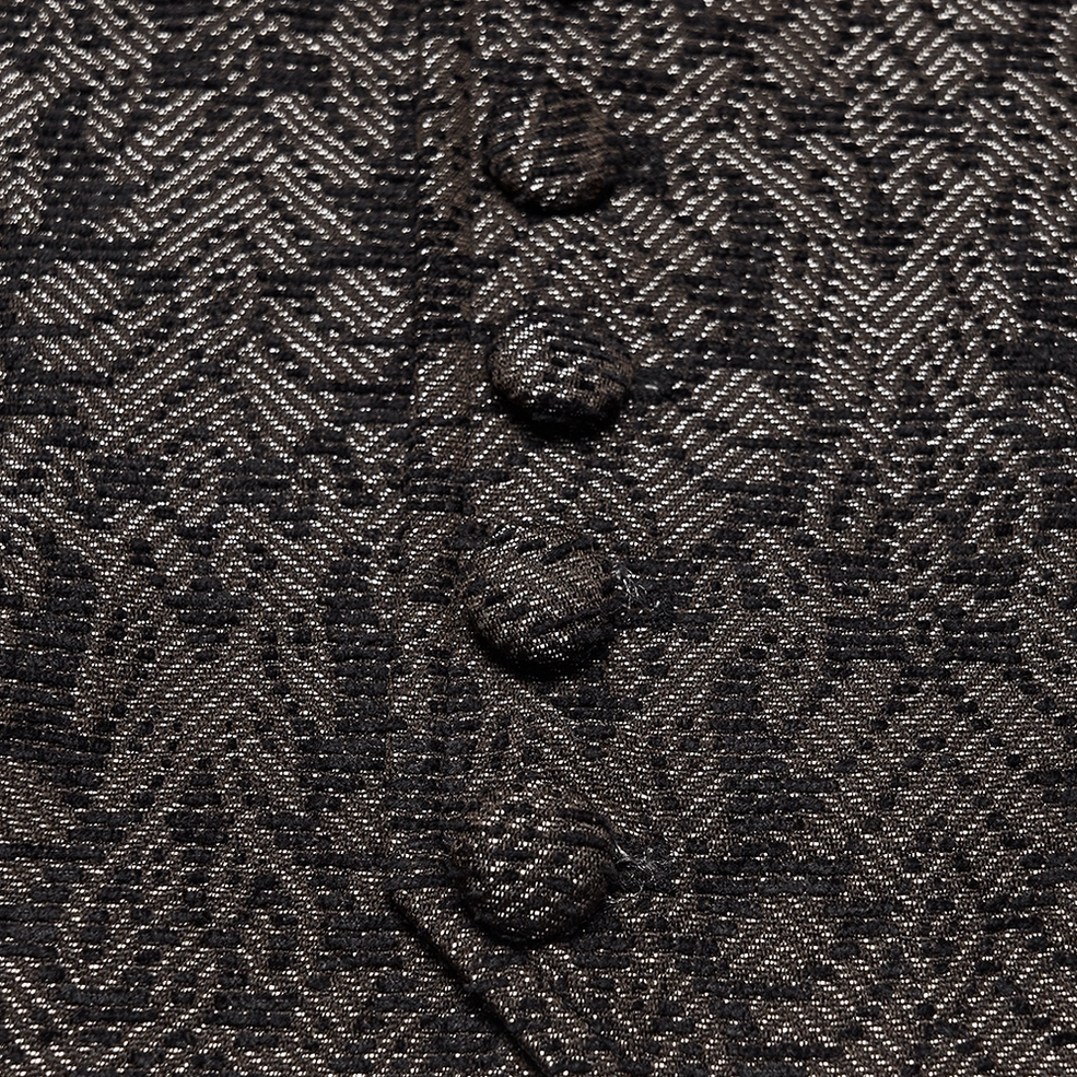 Close-up detail of coffee jacquard waistcoat front showing covered buttons and dense floral pattern