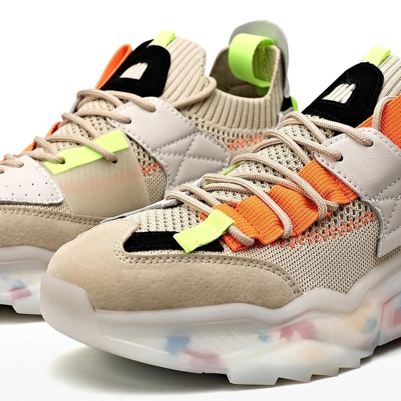 Khaki gothic platform sneaker with neon green straps and quilted leather panels, close-up side view