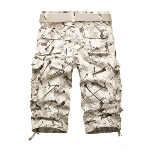 Light khaki graffiti print tactical cargo shorts with metal zipper fly and waist belt detail, studio flat lay perspective