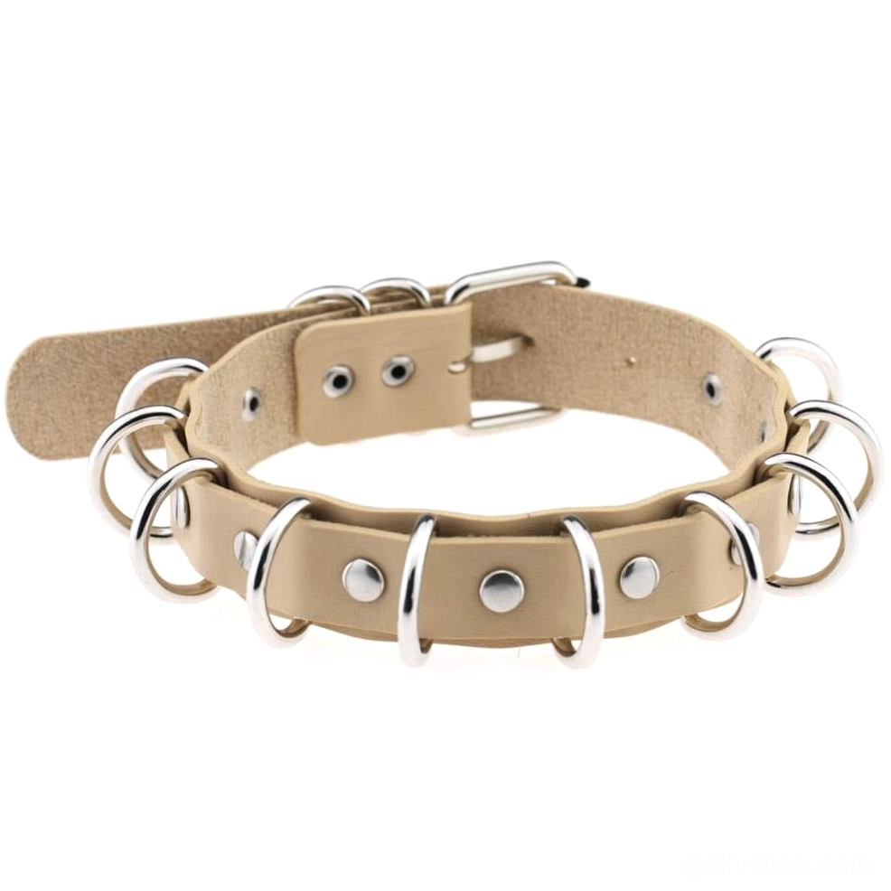 Khaki tan faux leather gothic choker with metal ring details and adjustable buckle on white background