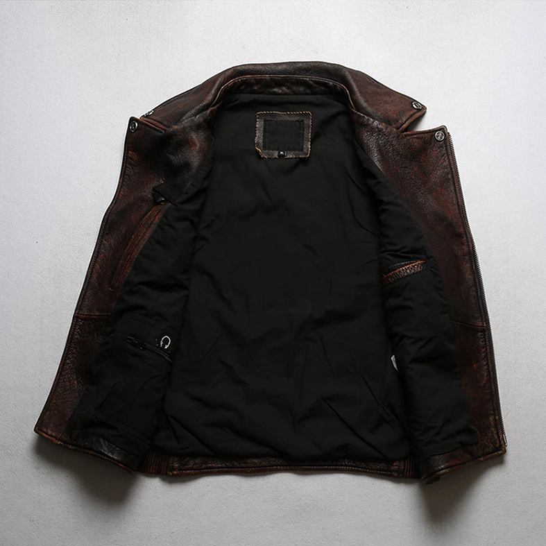 Interior view of genuine leather biker vest showing black polyester padded lining - craftsmanship detail