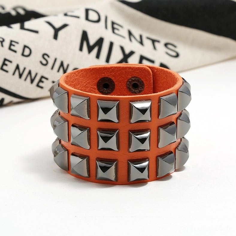 Studded leather gothic cuff bracelet snap closure mechanism - adjustable fit detail