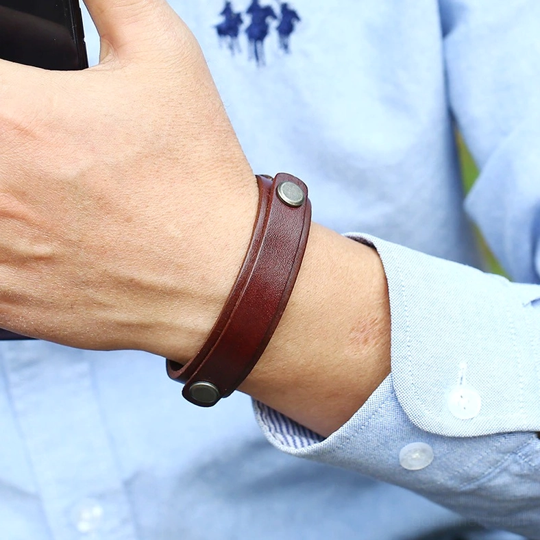 Collection view of genuine leather gothic cuff bracelets in multiple colors with antique silver hardware and adjustable buckles