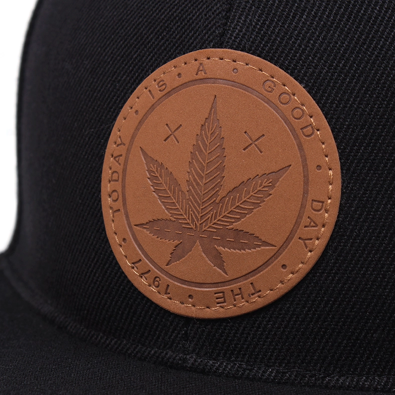 Close-up macro detail of genuine leather maple leaf badge with gothic aesthetic