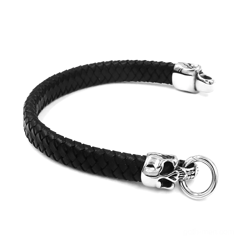 Rear view of gothic leather bracelet showing single skull buckle clasp and woven black leather strap