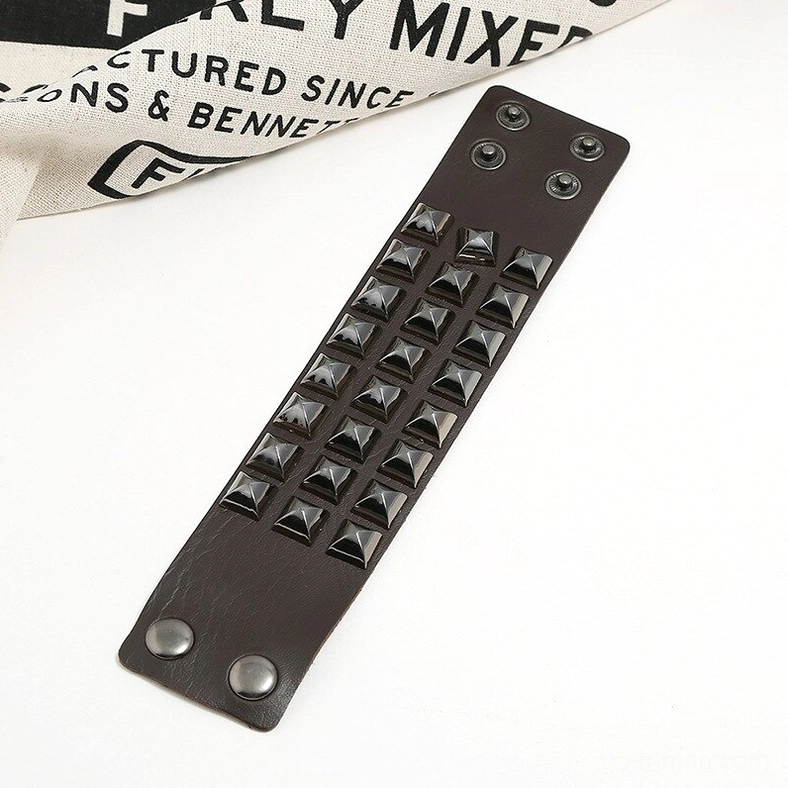 Premium leather studded gothic cuff bracelet texture close-up - pyramid stud details