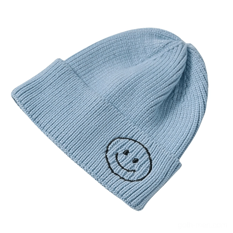 Light blue ribbed knit beanie with contrasting smiley face embroidery