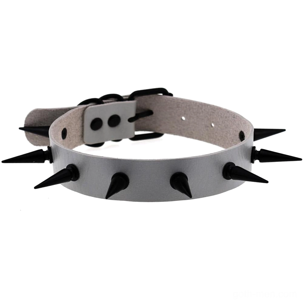 Light gray leather choker collar with silver-toned buckle and black spikes, top view