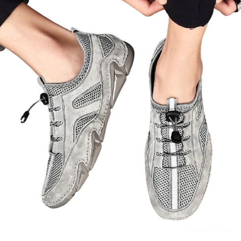 Light grey gothic sneaker on feet - side and top view showing breathable mesh design