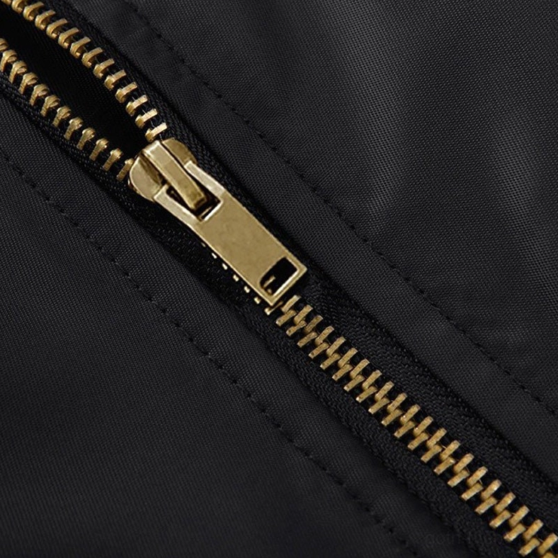 MA-1 bomber jacket close-up of bronze hardware and zipper quality - gothic military flight wear