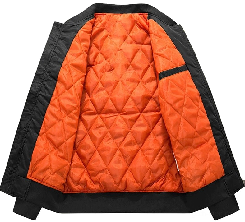 MA-1 bomber jacket inner lining detail showing bright orange quilted thermal padding - cotton bomber construction