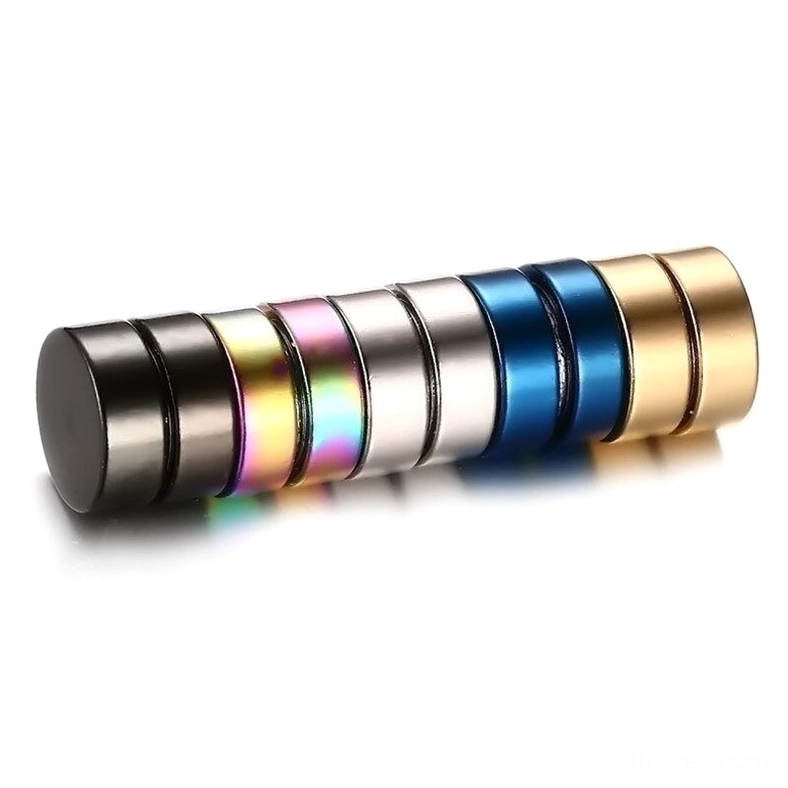 Assorted magnetic stud earrings stacked showing multiple color finishes including black silver and gold