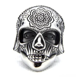 Gothic sugar skull ring direct front view showing detailed skull mandala engraving and Celtic knot patterns on silver tone finish