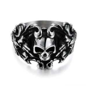 Memento mori skull ring stainless steel aged silver flat lay gothic biker jewelry overhead view