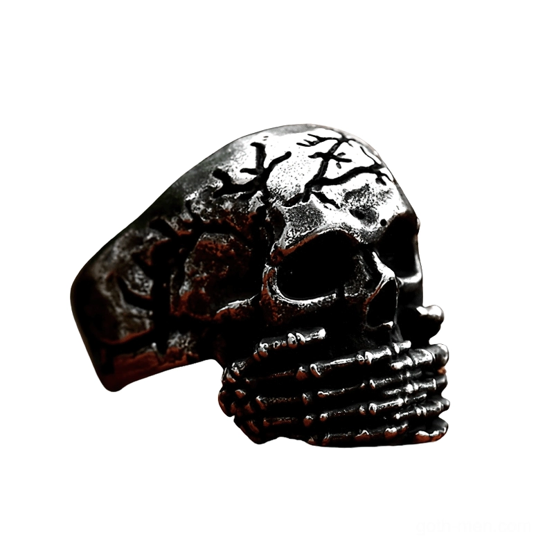 Memento mori skull ring right side view white background displaying cracked texture and dark patinated finish