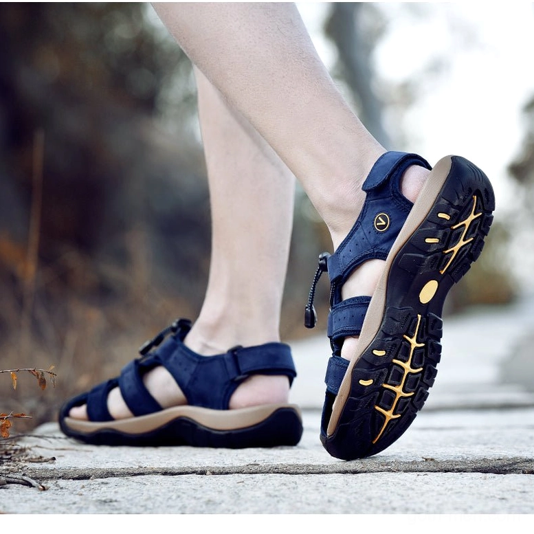 Men's leather gothic sandals featuring metal buckle hardware and reinforced sewing construction
