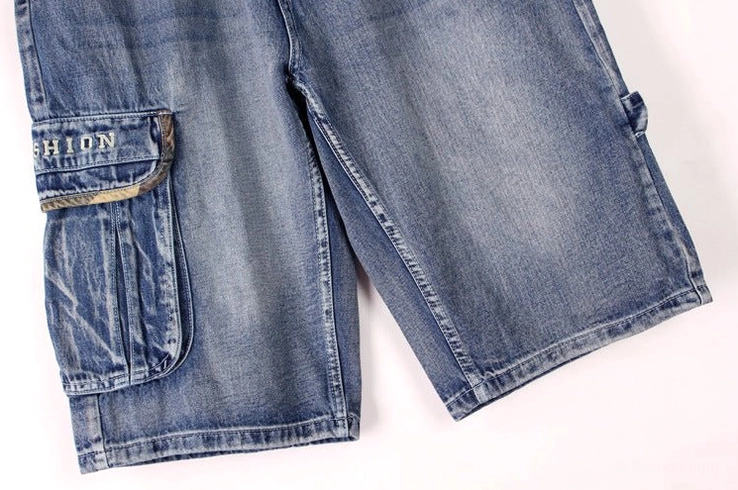 Men's gothic denim cargo capri shorts styling flat lay - loose fit alternative fashion streetwear piece