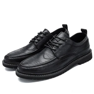Men's black split leather gothic derby shoes with lace-up closure and non-slip rubber sole, three-quarter view on white background