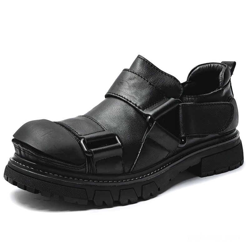Men's black leather gothic platform loafers with reinforced toe cap and chunky lug sole, three-quarter top view