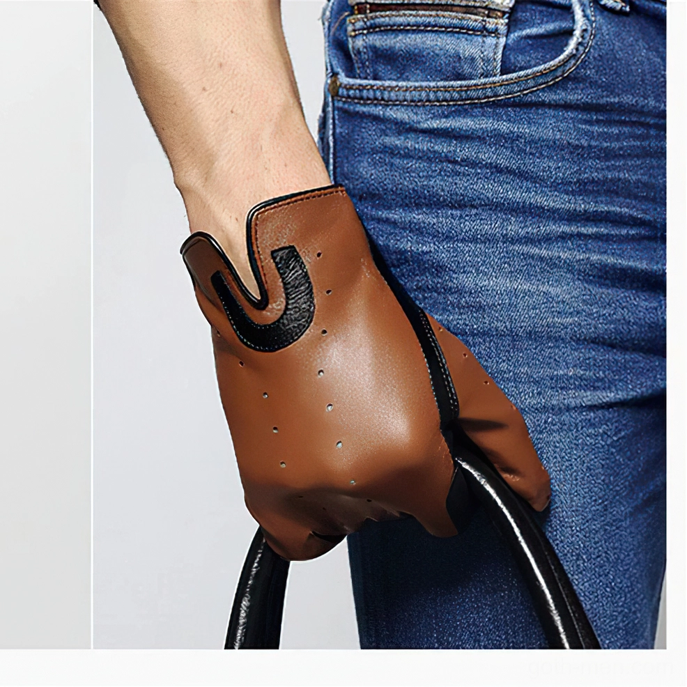 Brown sheepskin riding gloves worn by male model, close-up side view with equestrian background and black U-shaped decorative patches, riding crop display