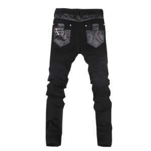 Men's gothic biker skinny pants rear view - faux leather back pockets with gold studs and leather waist trim
