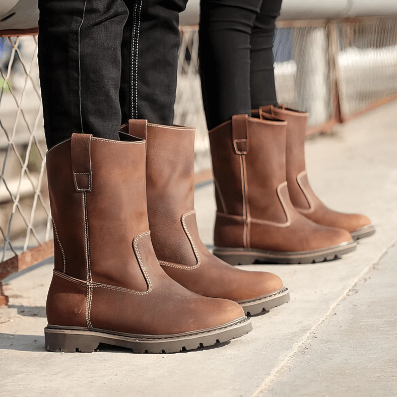 Men wearing brown gothic leather boots with black skinny jeans urban overpass