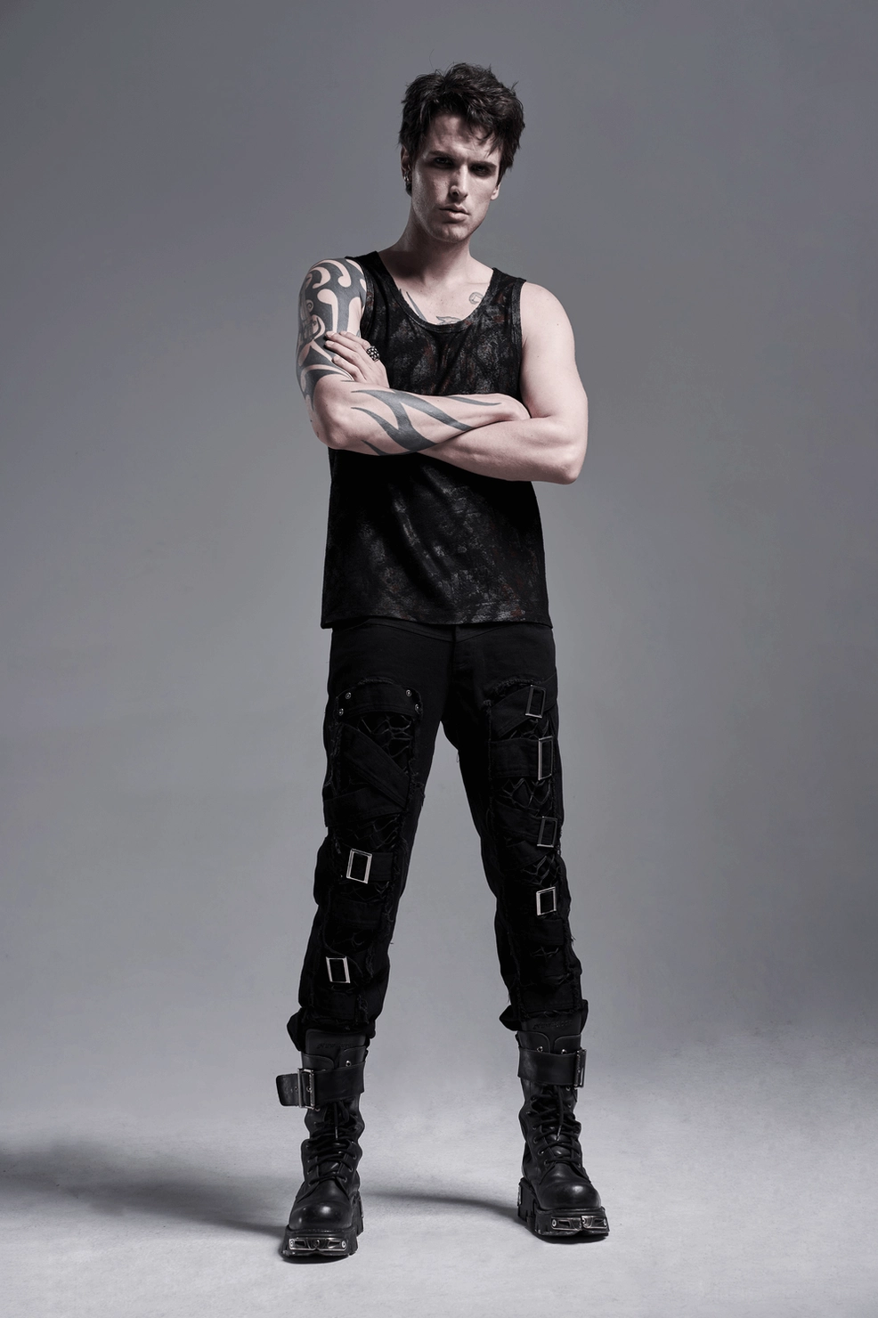 Men's black mesh buckle gothic cargo pants full body shot, alternative fashion punk style on model