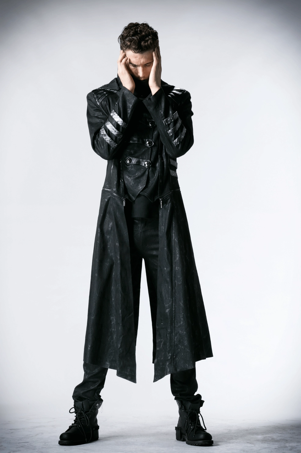 Men's gothic hooded coat showing high collar and structured hood framing