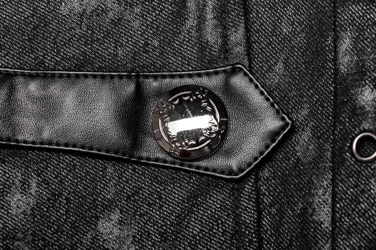 Men's gothic coat displaying layered buckle closures and punk-inspired design