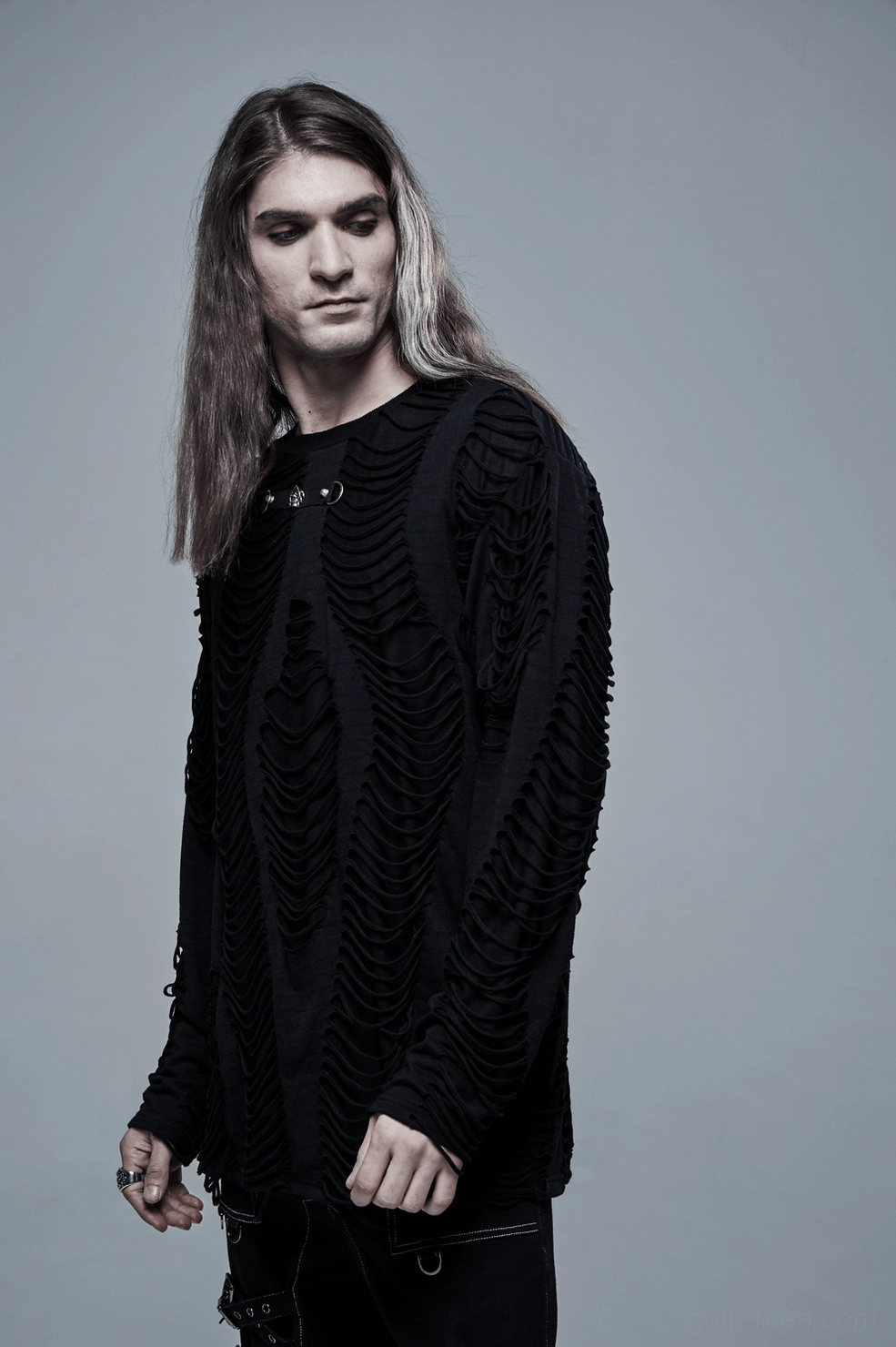 Black distressed gothic long sleeve sweatshirt on model displaying front shredded skeletal pattern and style