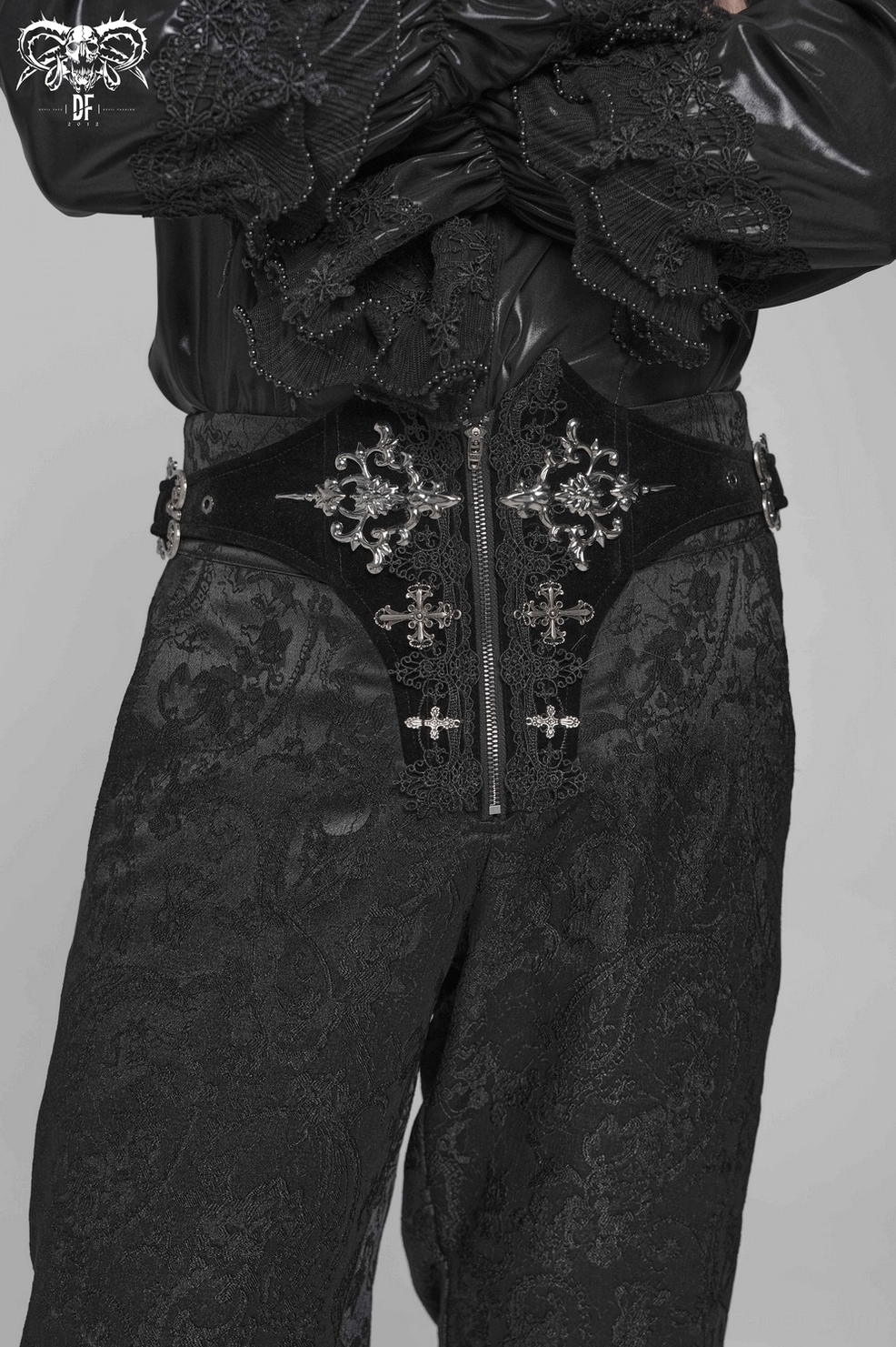 Gothic embroidered mens cargo pants showing cross embroidery detail and structural design elements