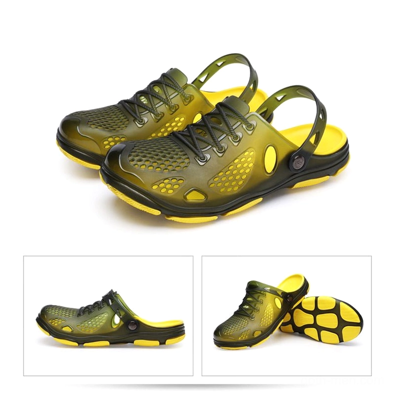 Pair of men's acid yellow-green gradient gothic jelly sandals in flat lay configuration with detailed upper visibility