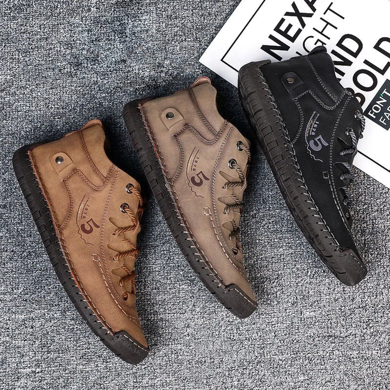 Full product shot of gothic lace-up ankle boots displaying overall form, color variation, and winter aesthetic