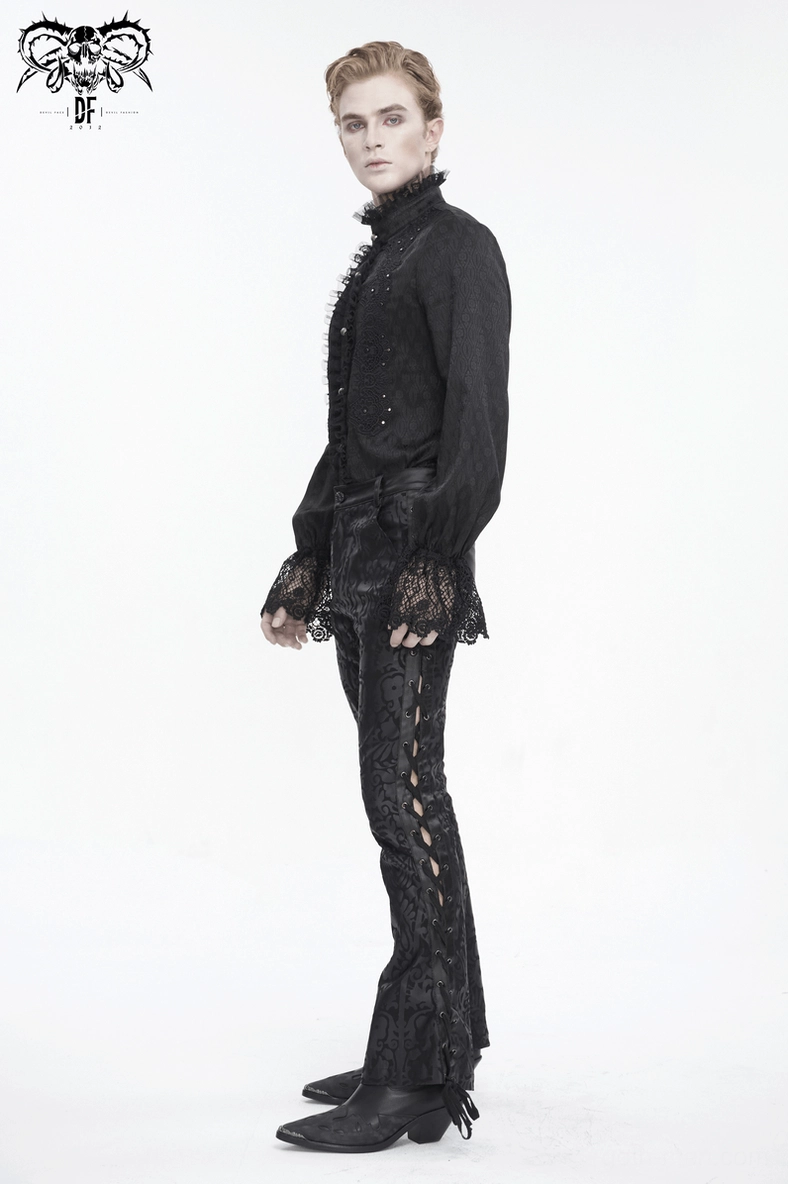 Man modeling gothic lace-up flared pants styled with alternative fashion accessories