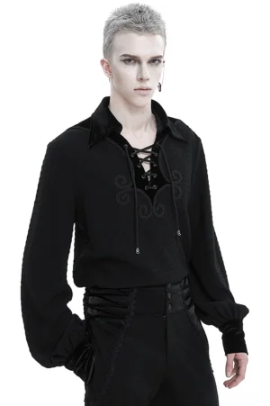 Men's black gothic lace-up puff sleeve shirt front three-quarter view with velvet collar and trim worn by model