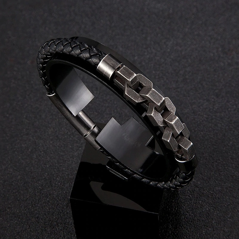 High-magnification view of men's gothic leather chain bracelet clasp and gunmetal hardware construction details